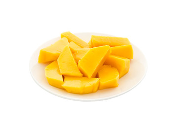 Mango slices in plate isolated on white background
