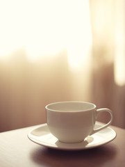 cup of coffee on blurred background