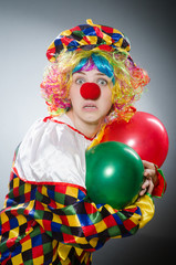 Funny clown in comical concept
