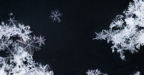 Real snowflakes shot on a car window