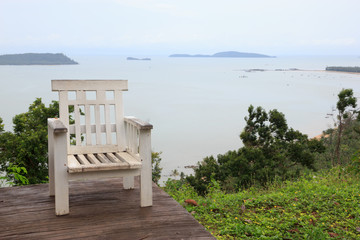 Wooden chairs with sea views