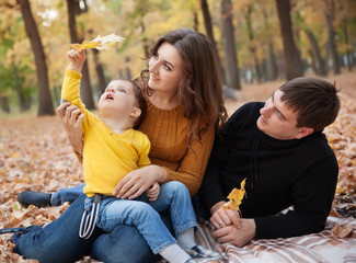 Family in the autumn park