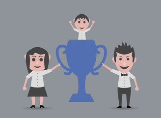 father and mother taking prix cup with boy