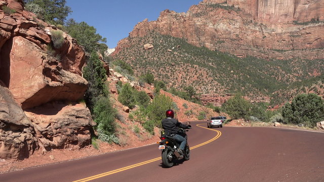 Zion National Park traffic down mountain road 4K 149