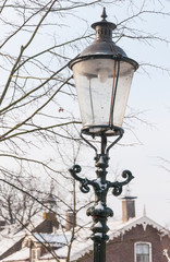 Fototapeta na wymiar Old lantern in the winter season