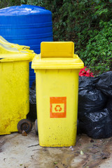 Different colored bins to separate waste