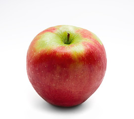 Red and green apple on white background