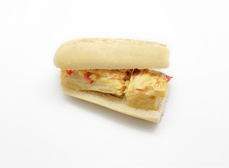 Spanish omelette sandwich with olive oil and red pepper isolated