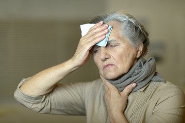 senior woman feel unwell
