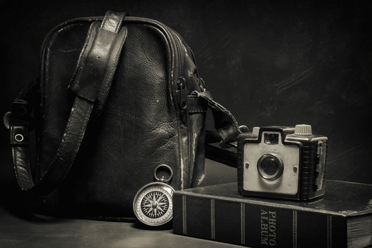 Still life of Vintage camera and bag