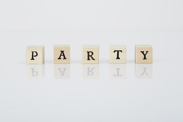 Scrabble tiles spell 'Party' in studio