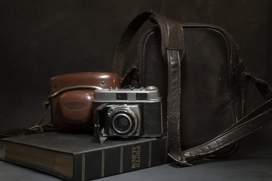 Still life of Vintage camera and bag