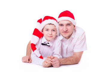 father and son in Santa's hats