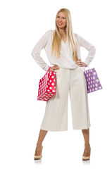 Woman with shopping bags on white