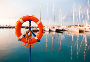 Fototapeta premium life belt at a yacht harbor