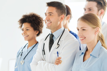 group of happy doctors at hospital