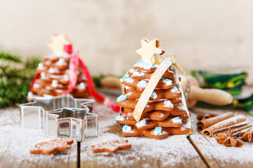 Homemade baked Christmas gingerbread tree on vintage wooden back