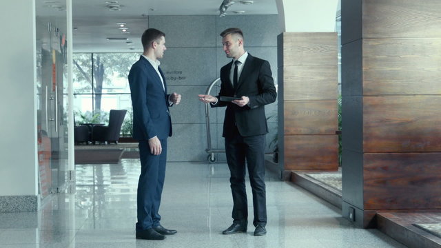 Dialogue of two businessmen