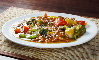 pork with tart sweet sauce,pineapple and pepper