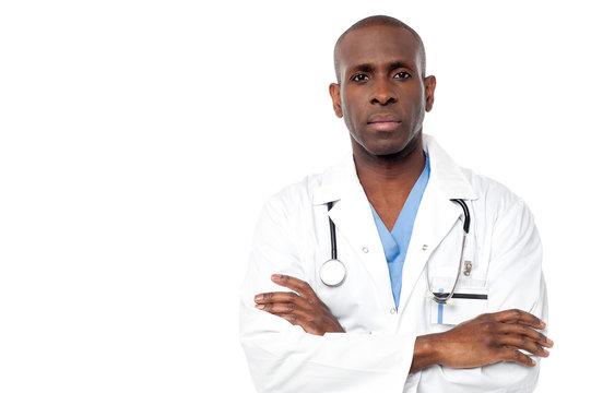 Male doctor posing  with arms crossed