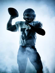 Foto op Plexiglas american football player silhouette © snaptitude