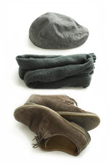 Hats, scarves and boots on a white background