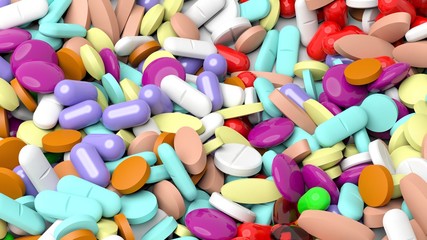 Pile of various colorful pills background.