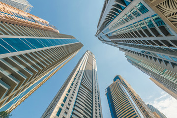 Fototapeta na wymiar Tall Dubai Marina skyscrapers in UAE