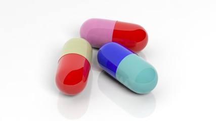 Colorful caplets, isolated on white background.