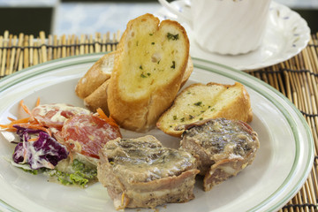 Grilled steak wrapped in bacon