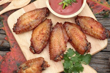 Fried chicken wings with sauce of delicious.