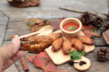 Fried chicken wings with sauce of delicious.