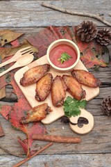 Fried chicken wings with sauce of delicious.