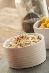 Bowl of oat flakes close up