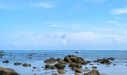 clear blue sky and rocks beach at Bangtao beach , Phuket island in Thailand
