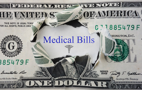 Medical Bills message with torn dollar bill