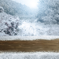 Fototapeta premium wooden desk space and snow 