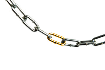 golden link in a steel chain