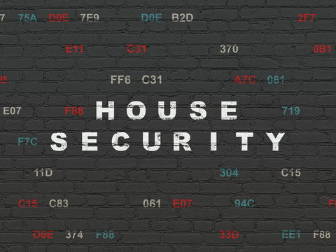 Privacy concept: House Security on wall background