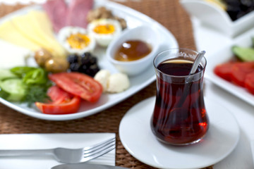 Rich and delicious Turkish breakfast on white wood table
