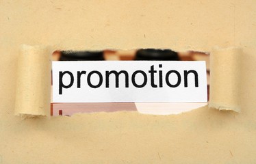 Promotion tag on ripped paper
