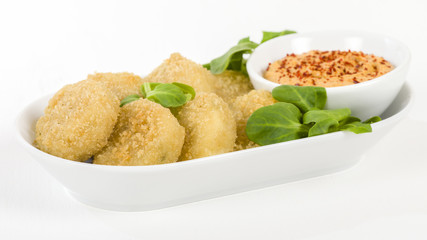 Deep Fried Cheese - Breaded and deep fried cheese served with dipping sauce.
