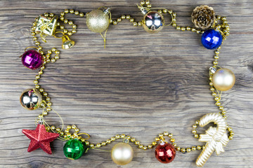 Christmas decorations on old wooden background.