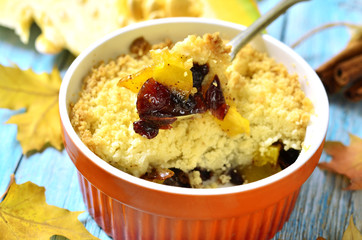 Sweet pumpkin crumble with dried cranberry.