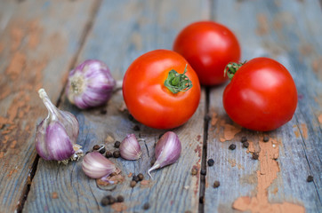 The farm vegetable piece with garlic, tomatoes and black papper