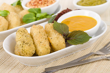 Deep Fried Cheese - Breaded and deep fried cheese served with dipping sauce.
