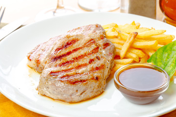 Chicken steak with fries