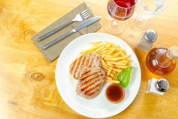 Chicken steak with fries