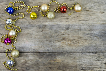 Christmas decorations on old wooden background.