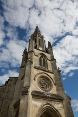 Fototapeta na wymiar Beautiful church on a cloudy blue sky